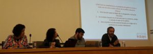 Representantes de los presidenciables debatiendo sobre inclusion